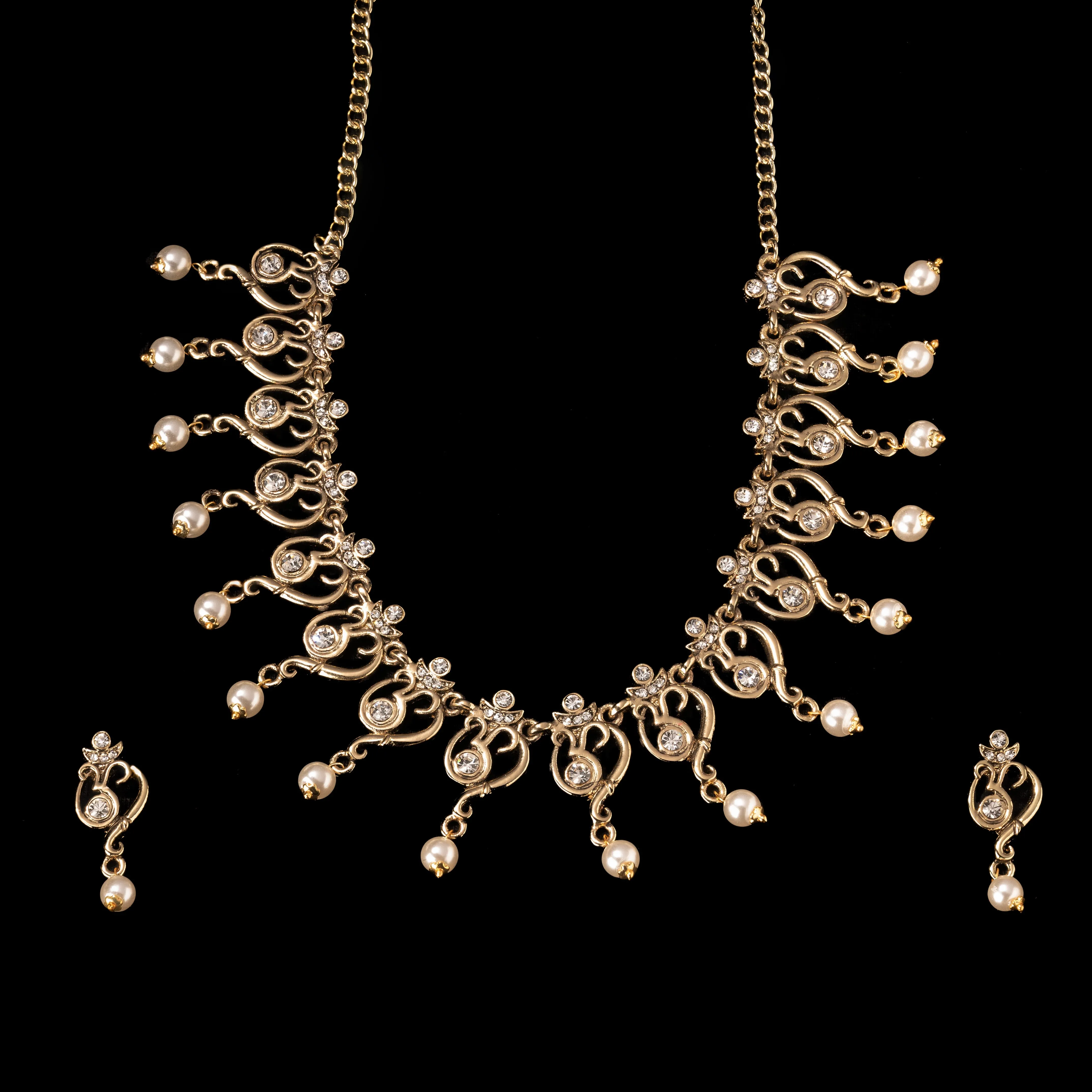 Estele Gold Plated Antique Spiritual Om Shaped Necklace Set with Austrian Crystals & Glowing Pearls for Women