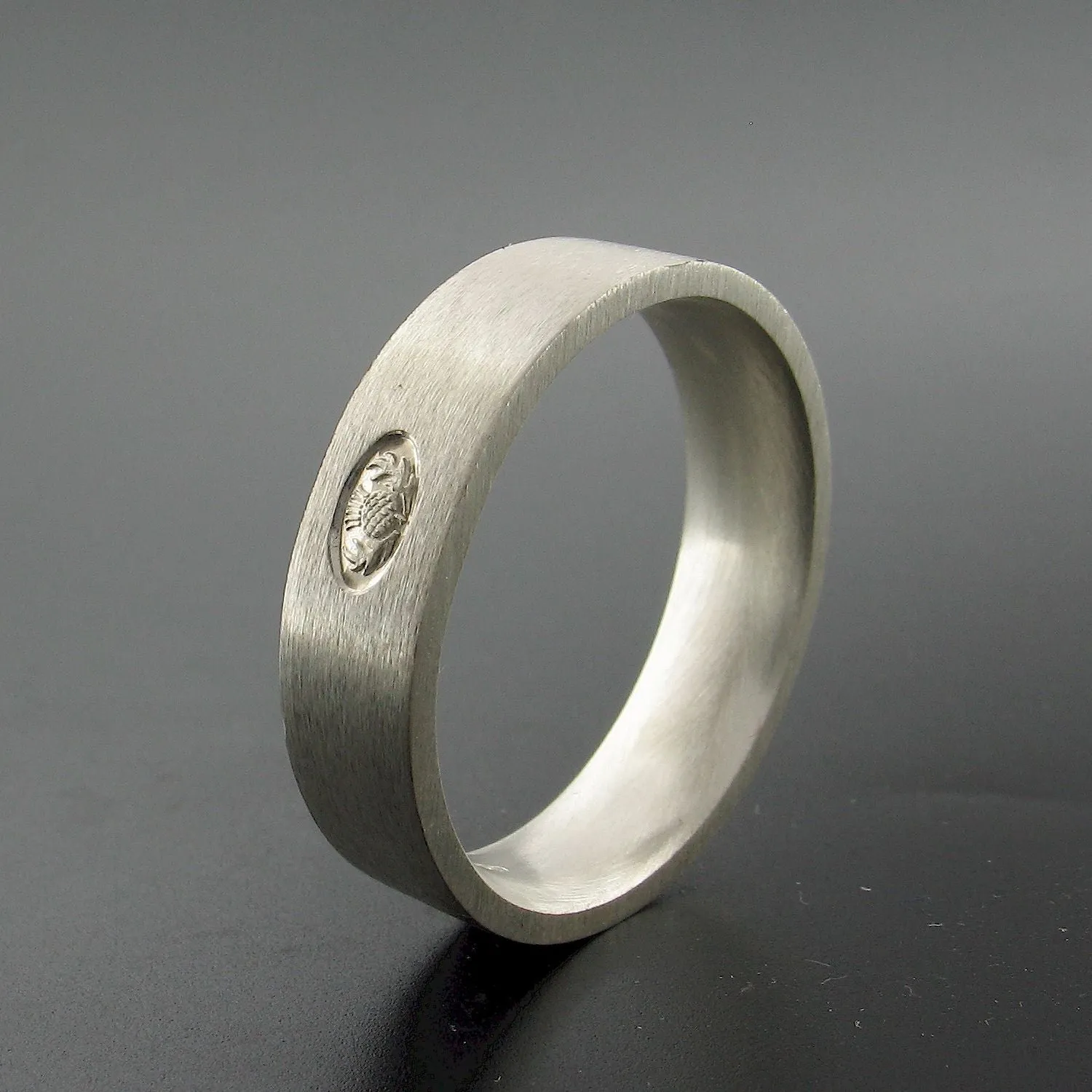 Silver wedding ring, Scottish flat medium brushed band.