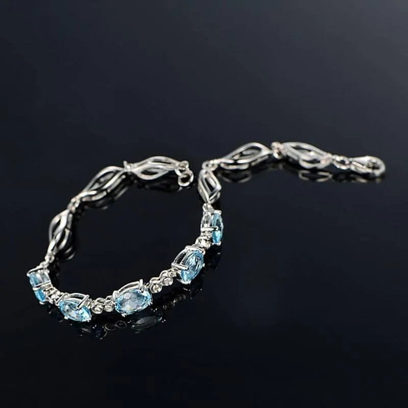 Sterling Silver Blue Topaz Charm Bracelet